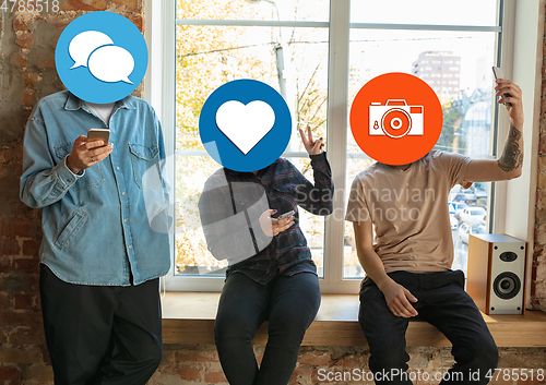 Image of Creative millenial people connecting and sharing social media. Modern UI icons as heads