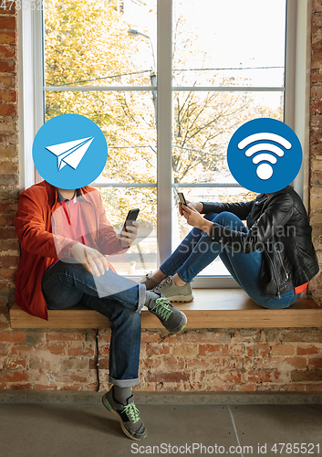 Image of Creative millenial people connecting and sharing social media. Modern UI icons as heads