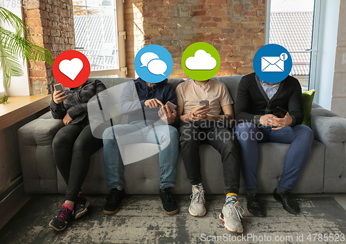 Image of Creative millenial people connecting and sharing social media. Modern UI icons as heads