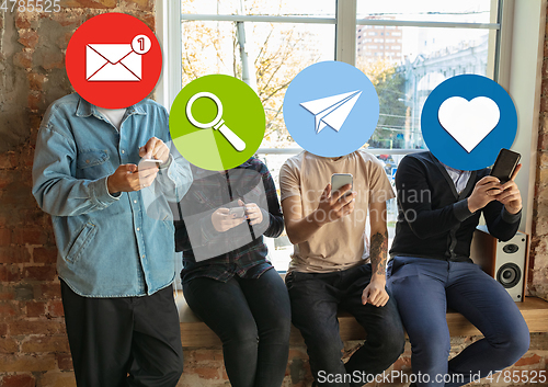 Image of Creative millenial people connecting and sharing social media. Modern UI icons as heads