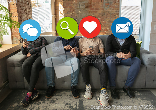 Image of Creative millenial people connecting and sharing social media. Modern UI icons as heads