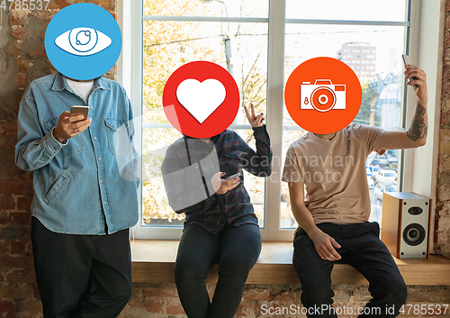 Image of Creative millenial people connecting and sharing social media. Modern UI icons as heads