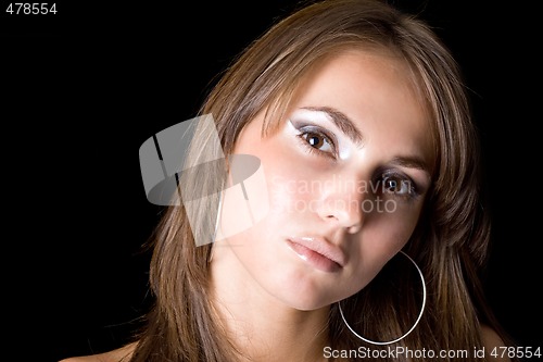 Image of Portrait of the young woman. Isolated on black background