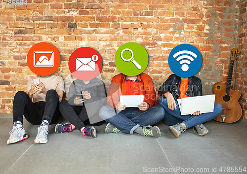 Image of Creative millenial people connecting and sharing social media. Modern UI icons as heads