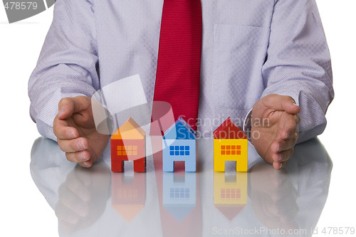 Image of Real estate agent showing houses