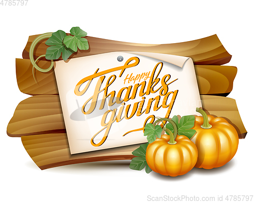 Image of Thanksgiving card with wooden banner and pumpkins with leaves