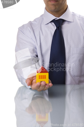 Image of businessman selling a house