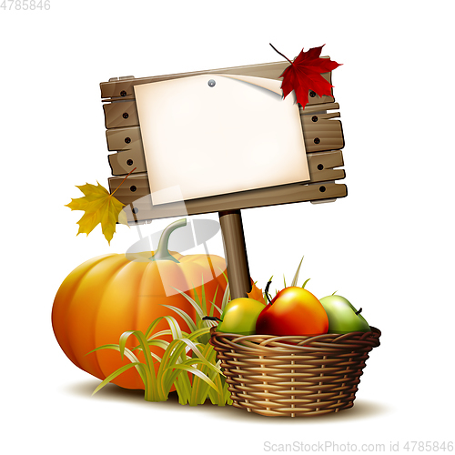 Image of Old Wooden banner with Orange pumpkin, Autumnal leaves and basket full ripe apples