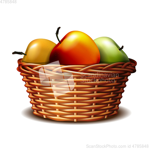 Image of Red and green ripe apples in the basket.