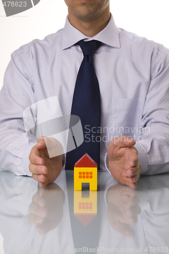 Image of Real estate agent showing houses