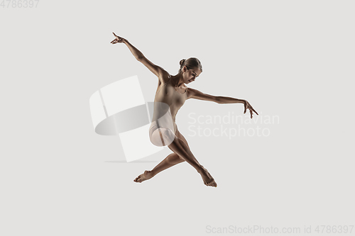 Image of Modern ballet dancer. Contemporary art ballet. Young flexible athletic woman.