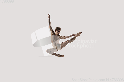 Image of Modern ballet dancer. Contemporary art ballet. Young flexible athletic man.