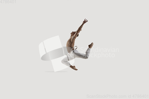 Image of Modern ballet dancer. Contemporary art ballet. Young flexible athletic man.