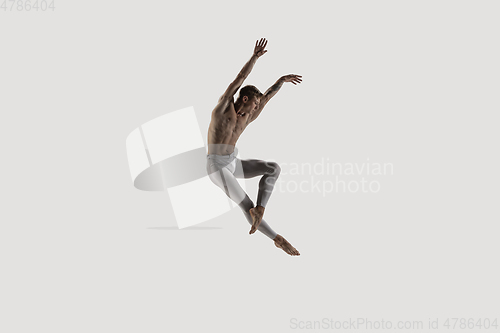 Image of Modern ballet dancer. Contemporary art ballet. Young flexible athletic man.