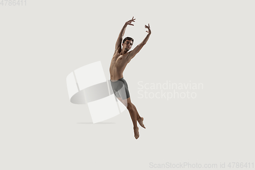 Image of Modern ballet dancer. Contemporary art ballet. Young flexible athletic man.