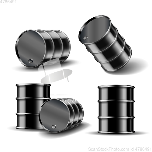 Image of Set of Black metal oil barrel in different position isolated on white