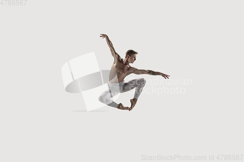 Image of Modern ballet dancer. Contemporary art ballet. Young flexible athletic man.