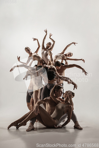 Image of The group of modern ballet dancers. Contemporary art ballet. Young flexible athletic men and women.