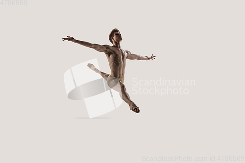 Image of Modern ballet dancer. Contemporary art ballet. Young flexible athletic man.