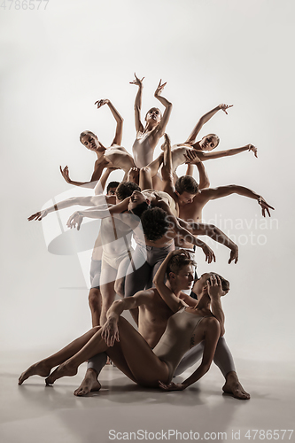 Image of The group of modern ballet dancers. Contemporary art ballet. Young flexible athletic men and women.