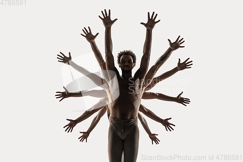 Image of The group of modern ballet dancers. Contemporary art ballet. Young flexible athletic men and women.