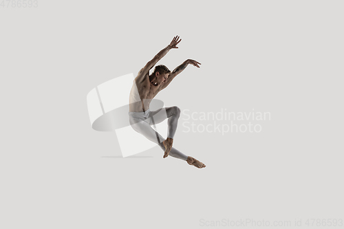 Image of Modern ballet dancer. Contemporary art ballet. Young flexible athletic man.