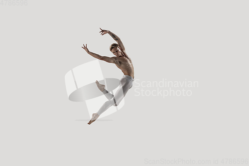 Image of Modern ballet dancer. Contemporary art ballet. Young flexible athletic man.