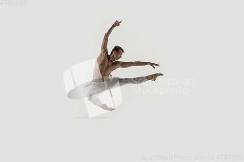 Image of Modern ballet dancer. Contemporary art ballet. Young flexible athletic man.