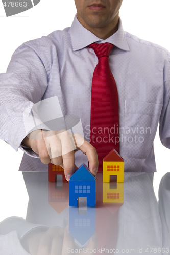Image of businessman selling a house
