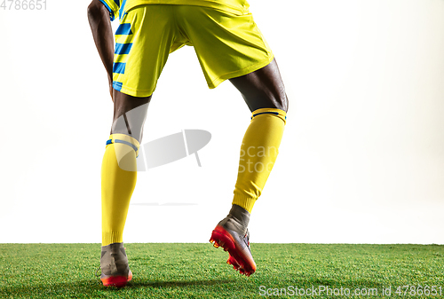 Image of Professional african football or soccer player isolated on white background