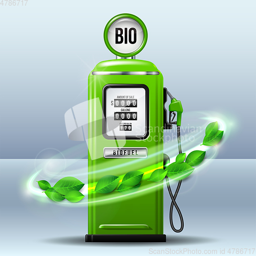 Image of Whirlwind of green leaves swirls around Green bright Gas station pump with fuel nozzle of petrol pump.