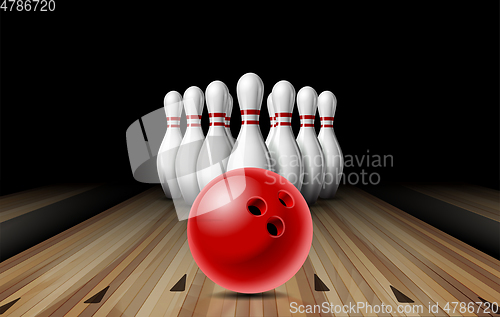 Image of Red glossy ball rolling on bowling alley line to ten placed in order white bowling pins.