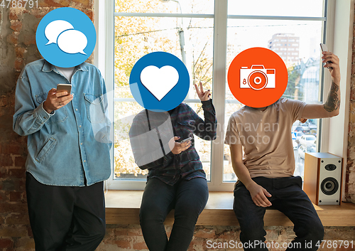 Image of Creative millenial people connecting and sharing social media. Modern UI icons as heads