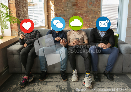 Image of Creative millenial people connecting and sharing social media. Modern UI icons as heads