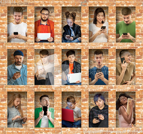 Image of Group of happy young people sharing in social media