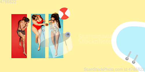 Image of Top view of young caucasian model\'s resting on beach resort