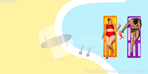 Image of Top view of young caucasian model\'s resting on beach resort