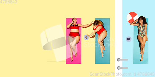 Image of Top view of young caucasian model\'s resting on beach resort