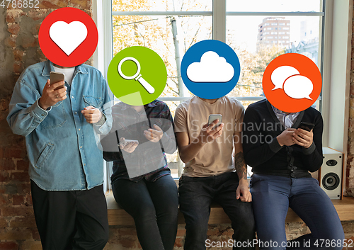 Image of Creative millenial people connecting and sharing social media. Modern UI icons as heads