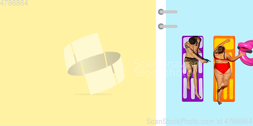 Image of Top view of young caucasian model\'s resting on beach resort