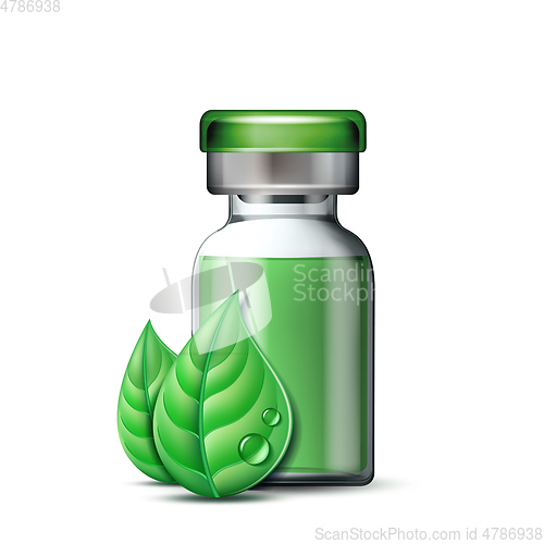 Image of Transparent glass ampule with vaccine or drug for medical treatment and two green leaves.