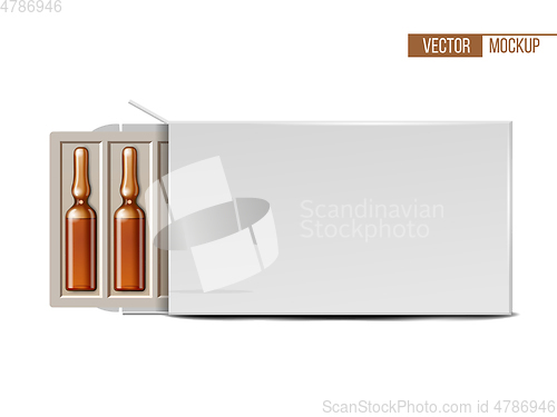 Image of Transparent glass medical ampoules in white package