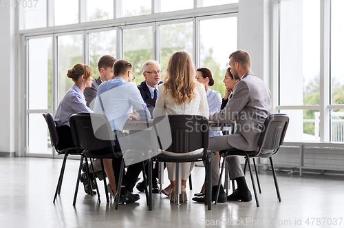 Image of business team meeting at office