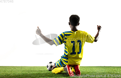 Image of Professional african football or soccer player isolated on white background