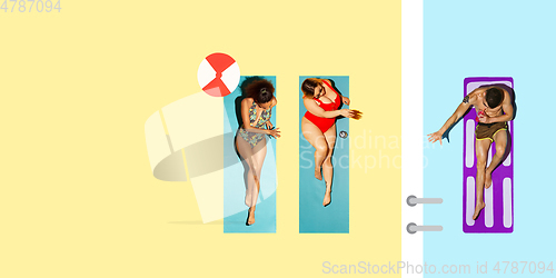 Image of Top view of young caucasian model\'s resting on beach resort