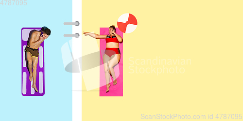 Image of Top view of young caucasian model\'s resting on beach resort