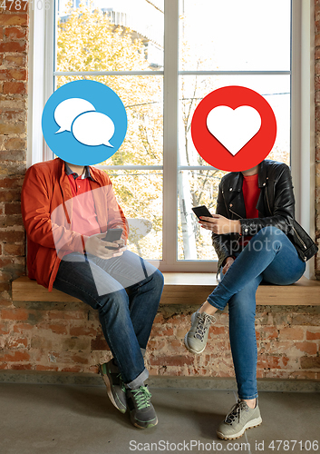 Image of Creative millenial people connecting and sharing social media. Modern UI icons as heads