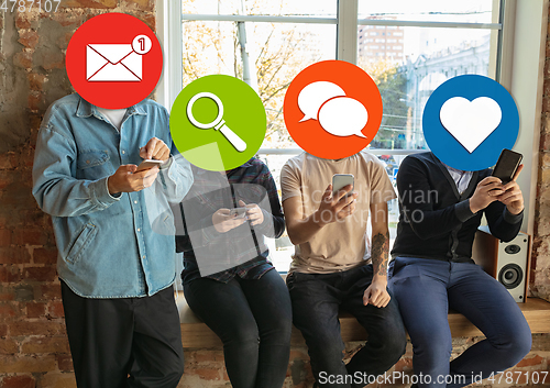 Image of Creative millenial people connecting and sharing social media. Modern UI icons as heads