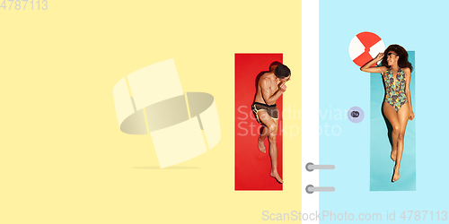 Image of Top view of young caucasian model\'s resting on beach resort