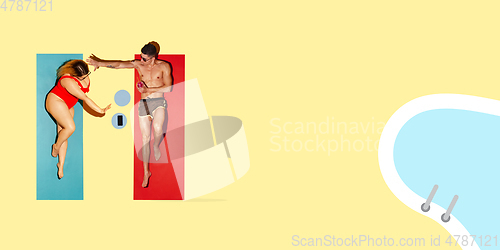 Image of Top view of young caucasian model\'s resting on beach resort